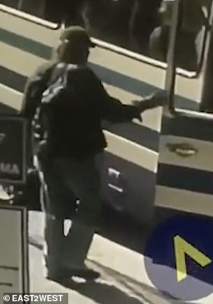 Maxim Krovishey, 44, was caught on camera as he boarded the bus