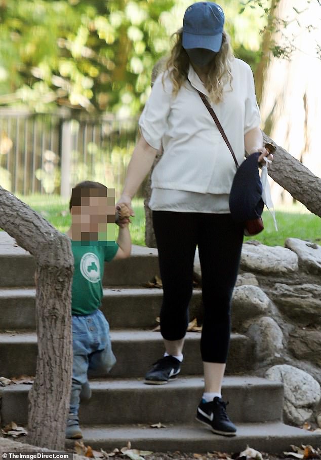 Family time: Rachel McAdams was spotted enjoying a sunny walk in Los Angeles this week with her two-year-old son