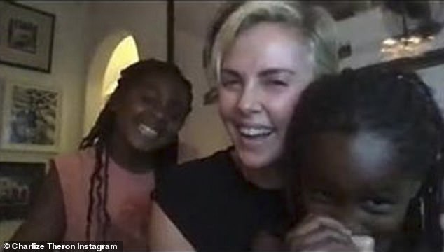 Rare: Charlize Theron gave fans on Instagram a rare glimpse at life with her two daughters, August and Jackson, when she shared a screenshot from her virtual 45th birthday party