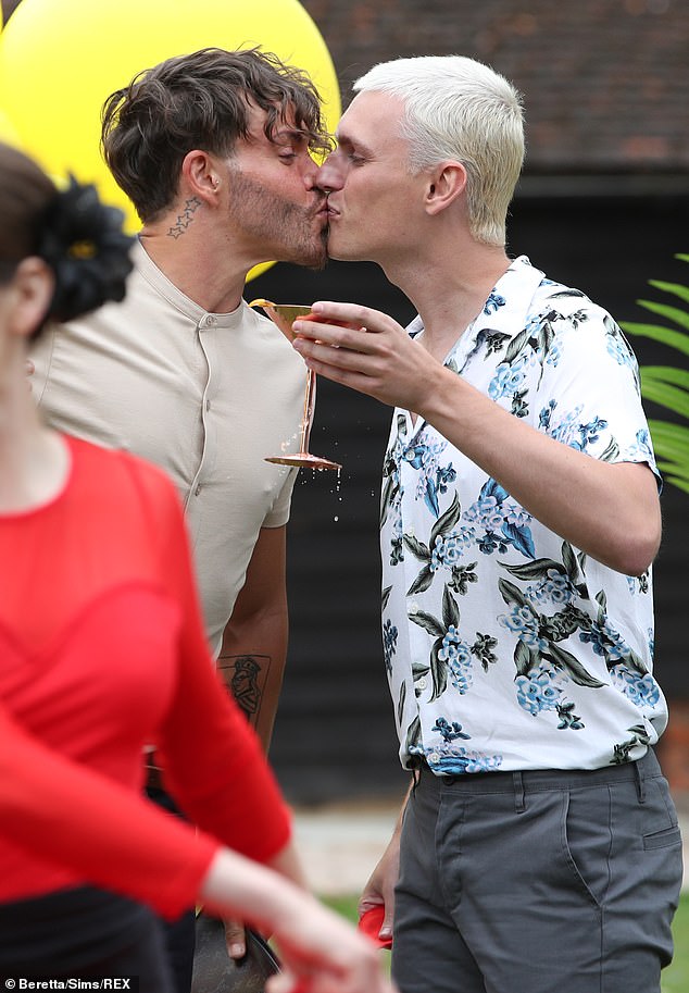 Loved-up: The reality star, who turned 34 on Saturday, shared a kiss with his beau to thank him for throwing the lively event