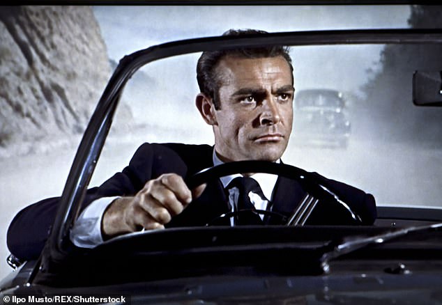 Legend: The film star, who was the original actor to portray James Bond, appeared in seven 007 films and is considered by many to be the best Bond ever (pictured in Goldfinger, 1964)