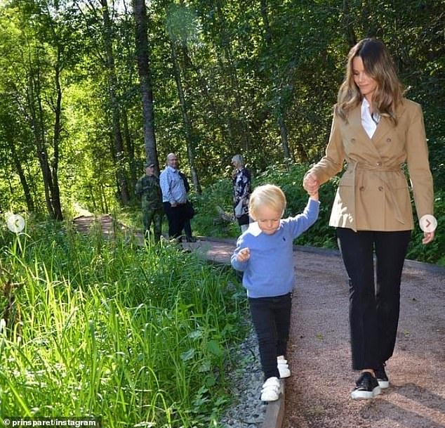 Prince Gabriel holds his mother