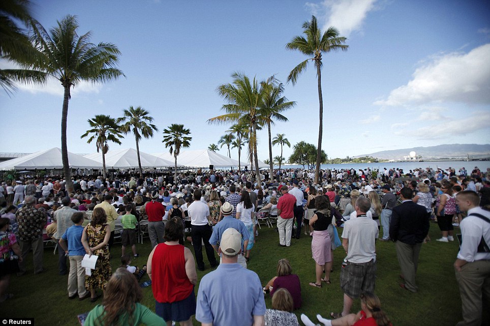 Paying their respects: Hundreds of people attend the 70th anniversary of the attack on Pearl Harbor at the World War II Valor in the Pacific National Monument in Honolulu, Hawaii, on Wednesday