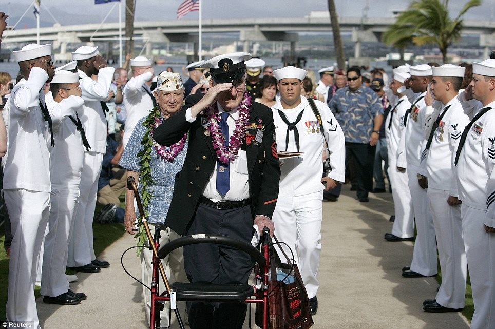 Salutes: Pearl Harbor survivor Edward Borucki participates in the 