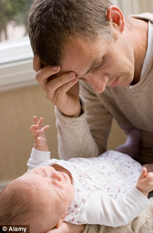 Stressful: Coping with a newborn can be hard on fathers too