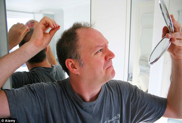 At 41, men start worrying about their double chins and thinning hair. But 53 is the age when women think a man stops looking sexy (stock image)