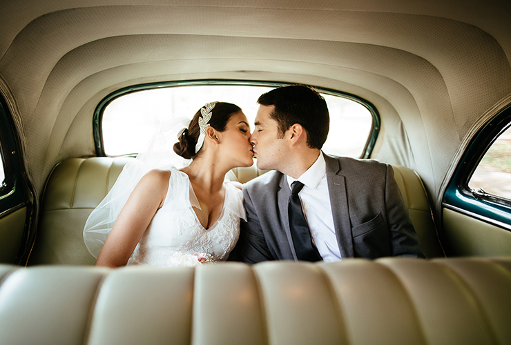 Couple kissing in car