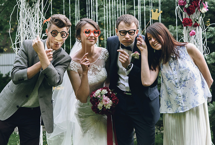 Wedding guests in photo booth