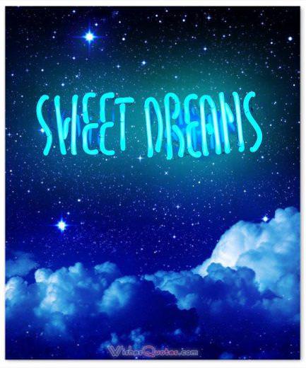 Good night message. A dark sky with clouds and a neon light with the message sweet dreams. 